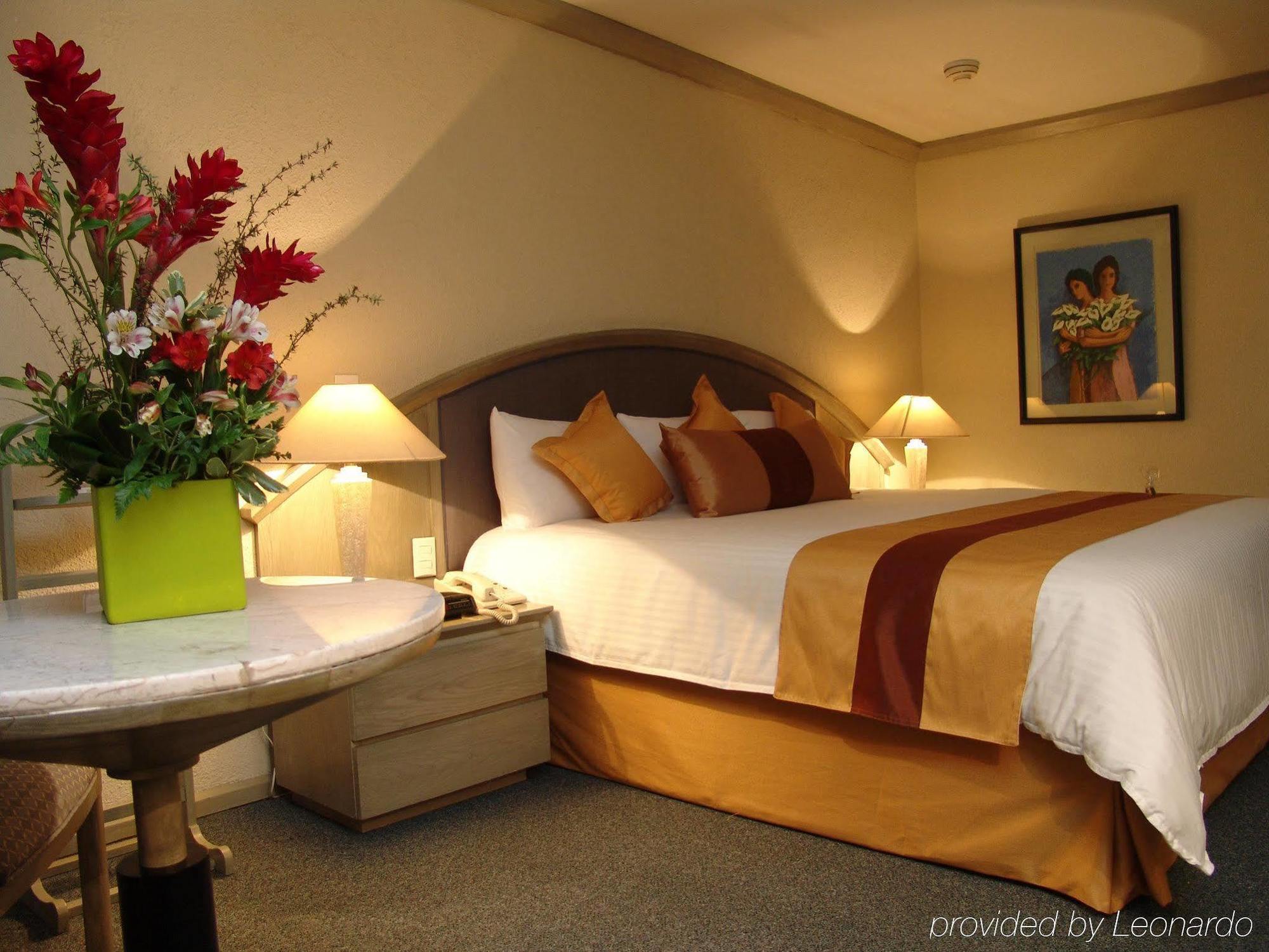 Radisson Paraiso Hotel Mexico City Room photo A bedroom at the hotel